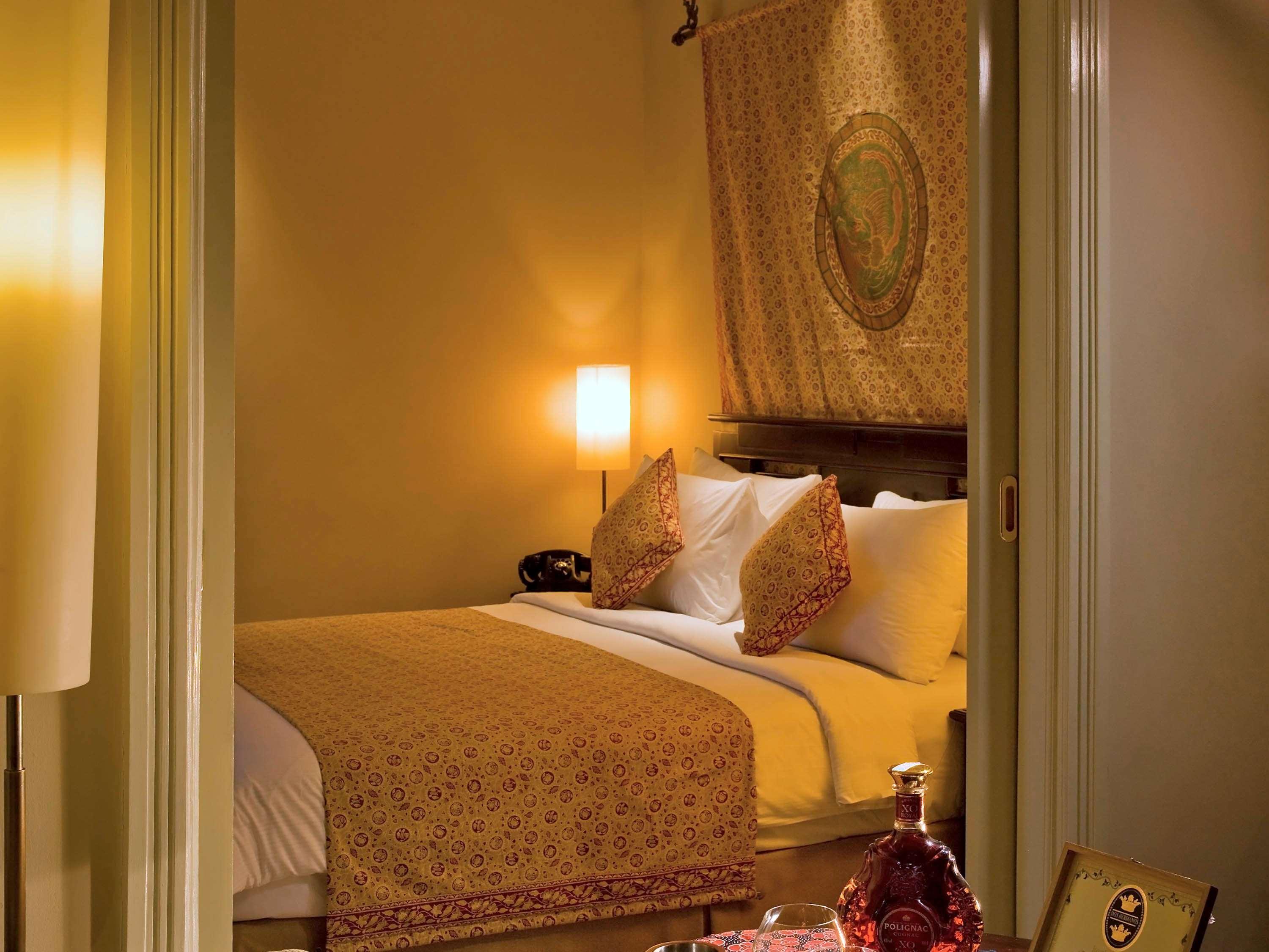 The Phoenix Hotel Yogyakarta - Handwritten Collection Exterior photo A bedroom at the Taj Mahal Palace