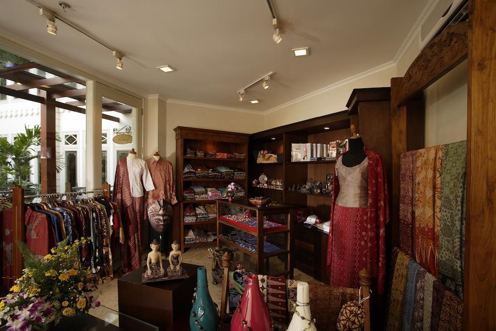 The Phoenix Hotel Yogyakarta - Handwritten Collection Exterior photo A shop in Yangon selling traditional Burmese clothing